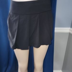 Shorts with pleated front